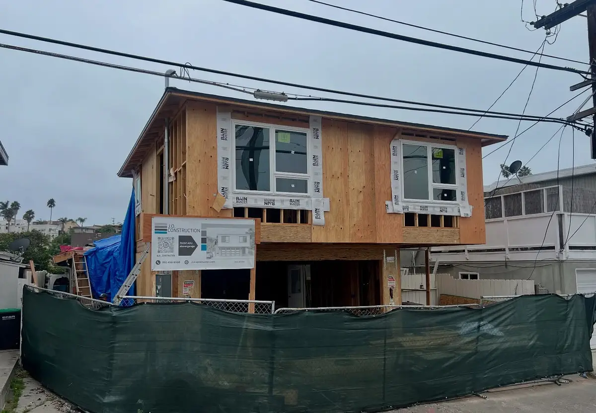 700 sq ft ADU above the garage in San Clemente, CA: above-garage adu framed and sheathed with windows set