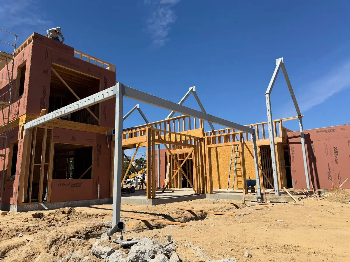 6,500 sq ft hillside custom home in Murrieta, CA: steel columns and beams standing on a custom home site